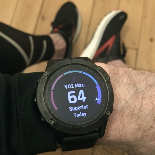 Garmin fenix fitness watch displaying a VO2 Max graph of 64